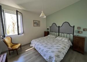 Postel nebo postele na pokoji v ubytování B&B Agriturismo Casa Vallona