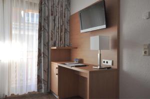 Kuchyň nebo kuchyňský kout v ubytování Hotel-Pension-Jasmin