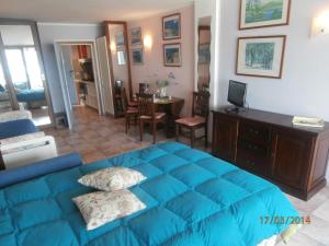 A bed or beds in a room at La Pianotta Sulla Spiaggia