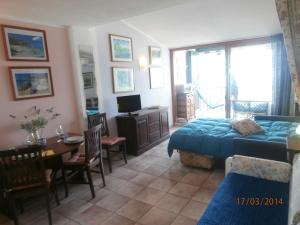 A bed or beds in a room at La Pianotta Sulla Spiaggia