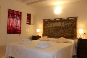 Łóżko lub łóżka w pokoju w obiekcie CHIARA HOUSE VENICE