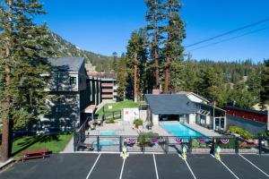 an aerial view of a house with a parking lot at Lakeview 826 Condo #108 Condo in Mammoth Lakes