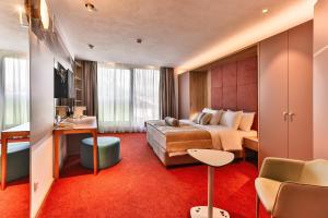 Posezení v ubytování Carine Hotel Centar