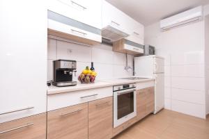 Kuchyňa alebo kuchynka v ubytovaní Anamari apartment