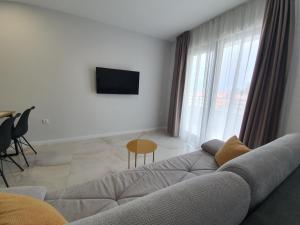 TV a/nebo společenská místnost v ubytování Bellissima Apartments
