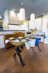 O bucătărie sau chicinetă la Bontempo Suite +20 fotografii