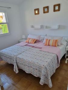 A bed or beds in a room at Bungalow Santa Fe de 2 habitaciones
