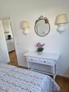 A bed or beds in a room at Bungalow Santa Fe de 2 habitaciones
