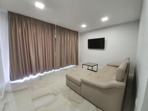 TV a/nebo společenská místnost v ubytování Bellissima Apartments