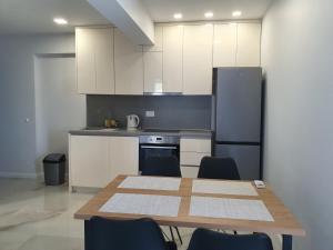 Kuchyň nebo kuchyňský kout v ubytování Bellissima Apartments