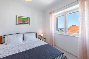 Postel nebo postele na pokoji v ubytování Apartment Ruzica