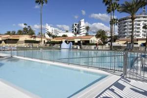 The swimming pool at or close to Bungalow Santa Fe de 2 habitaciones