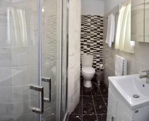 A bathroom at Cozy Bright Studio