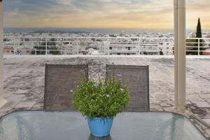 A balcony or terrace at Cozy Bright Studio