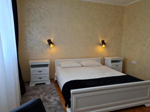 Кровать или кровати в номере Apartman Trifunović