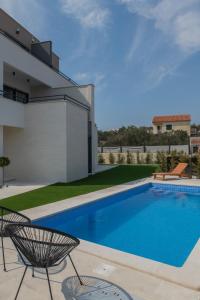 Bazén v ubytovaní Villa Magna luxury apartments alebo v jeho blízkosti