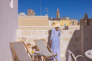 A balcony or terrace at Palazzo Manzoni by MANZONI COLLECTION
