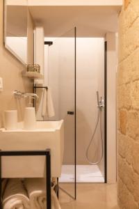 A bathroom at Palazzo Manzoni by MANZONI COLLECTION