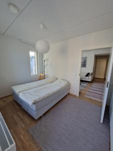 En eller flere senge i et værelse på Kalevan loisto - 40m2 Scandinavian apartment in Tampere