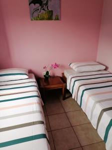 Postel nebo postele na pokoji v ubytování Αξέχαστη διαμονή - Unforgettable accommodation
