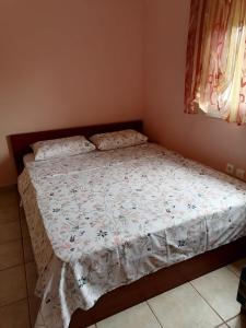 Postel nebo postele na pokoji v ubytování Αξέχαστη διαμονή - Unforgettable accommodation