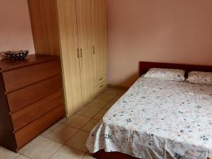 Postel nebo postele na pokoji v ubytování Αξέχαστη διαμονή - Unforgettable accommodation