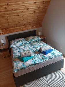 Posteľ alebo postele v izbe v ubytovaní Zielona Ostoja