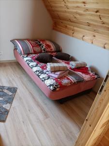 Postel nebo postele na pokoji v ubytování Zielona Ostoja