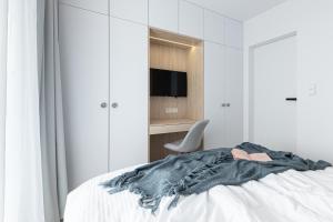 Posteľ alebo postele v izbe v ubytovaní Apartament MORSKIE WIDOKI Natural Baltic Darłówko