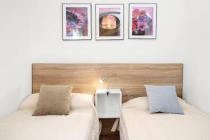 Una cama o camas en una habitación de Villa Santa Helena