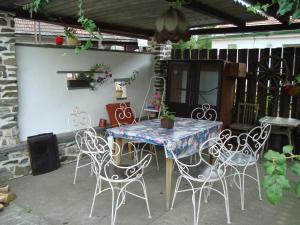 a table and chairs sitting on a patio at Privát Mirovice-Březnice in Mirovice
