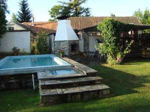 a swimming pool in the yard of a house at Privát Mirovice-Březnice in Mirovice