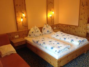 Ένα ή περισσότερα κρεβάτια σε δωμάτιο στο Weisssteinalm