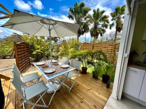 Taman di luar NOUVEAU studio chaleureux avec jacuzzi privé & piscine