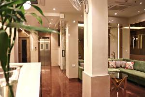 Posezení v ubytování RION - A Boutique Hotel