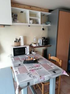 Kuchyň nebo kuchyňský kout v ubytování Chambre d'hôtes