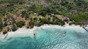 an aerial view of an island in the ocean at Islafuerteparadise in Puerto Limón