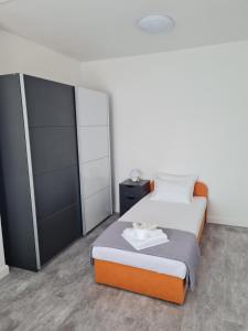 Postel nebo postele na pokoji v ubytování Charlene