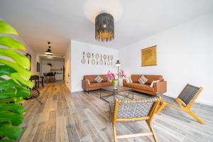 Posezení v ubytování CAN MARTINEZ Calella Beach Boutique Apartment