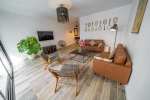 TV a/nebo společenská místnost v ubytování CAN MARTINEZ Calella Beach Boutique Apartment