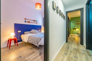 Postel nebo postele na pokoji v ubytování CAN MARTINEZ Calella Beach Boutique Apartment