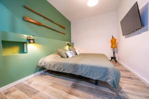 Postel nebo postele na pokoji v ubytování CAN MARTINEZ Calella Beach Boutique Apartment