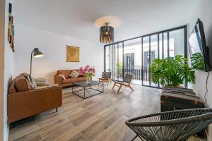 Posezení v ubytování CAN MARTINEZ Calella Beach Boutique Apartment