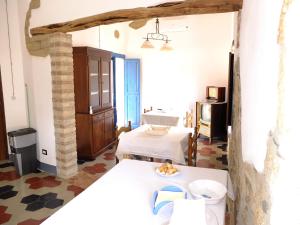 מיטה או מיטות בחדר ב-Casa Camilla Sardegna