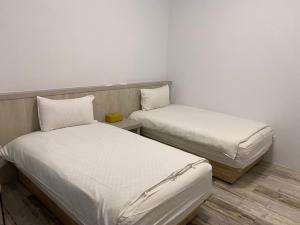 Postel nebo postele na pokoji v ubytování Memories Homestay