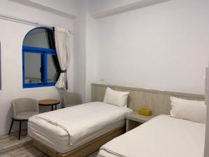 Postel nebo postele na pokoji v ubytování Memories Homestay