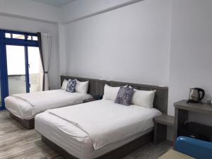 Postel nebo postele na pokoji v ubytování Memories Homestay