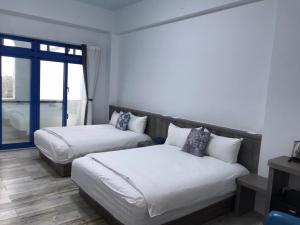 Postel nebo postele na pokoji v ubytování Memories Homestay