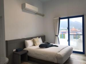Postel nebo postele na pokoji v ubytování Memories Homestay