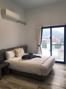 Postel nebo postele na pokoji v ubytování Memories Homestay